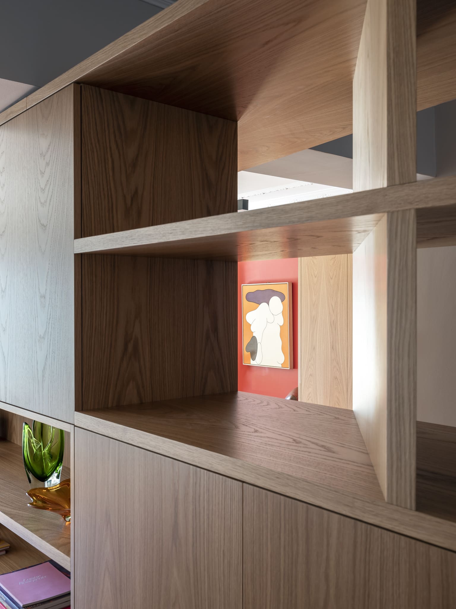 custom fitted walk-in wardrobe with elegant shaker-style doors and premium glass display shelving