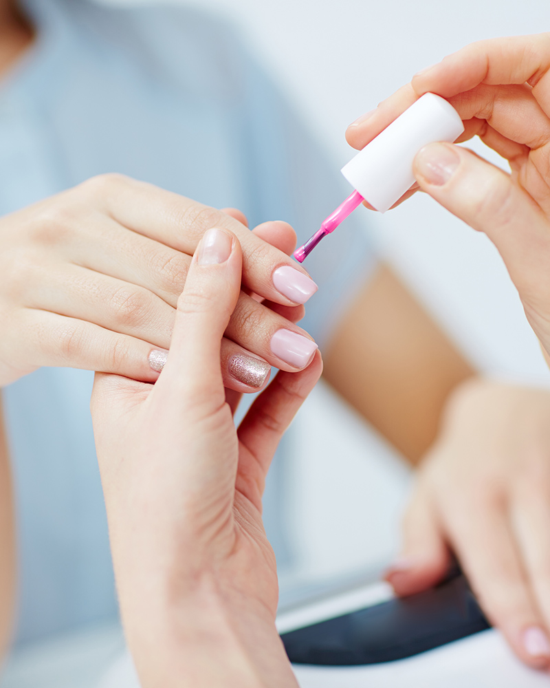 women receiving luxury nail treatment